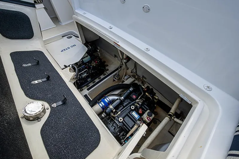  Yacht Photos Pics Engine compartment of 2016 Sabre 42 Salon Express yacht, showcasing mechanical components.
