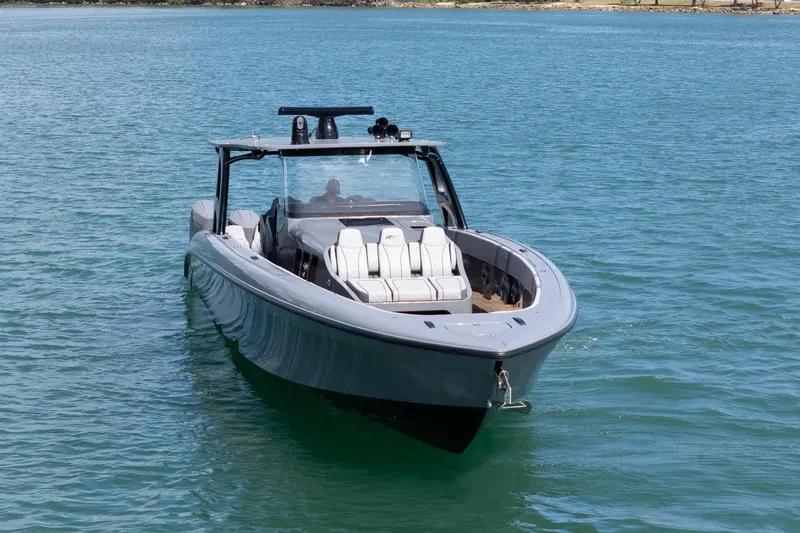  Yacht Photos Pics 2023 Midnight Express 43 Solstice boat on calm blue water.