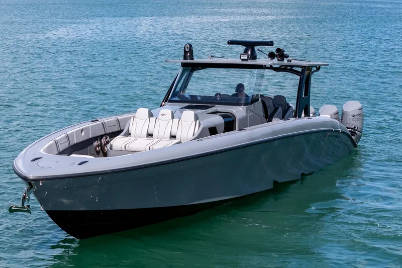  Yacht Photos Pics 2023 Midnight Express 43 Solstice boat on clear blue water.