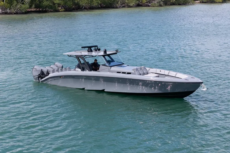  Yacht Photos Pics 2023 Midnight Express 43 Solstice boat cruising on calm blue waters.