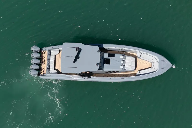 Yacht Photos Pics Aerial view of 2023 Midnight Express 43 Solstice luxury boat on water.
