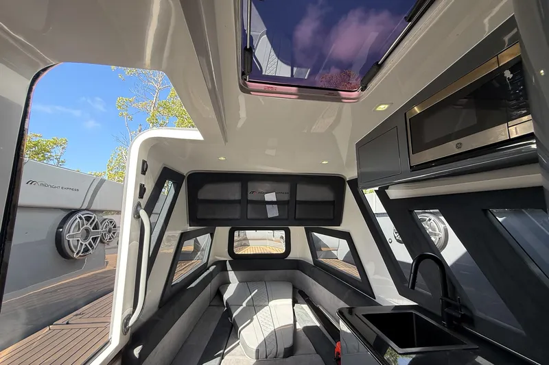  Yacht Photos Pics Interior of 2023 Midnight Express 43 Solstice boat with modern amenities and sleek design.
