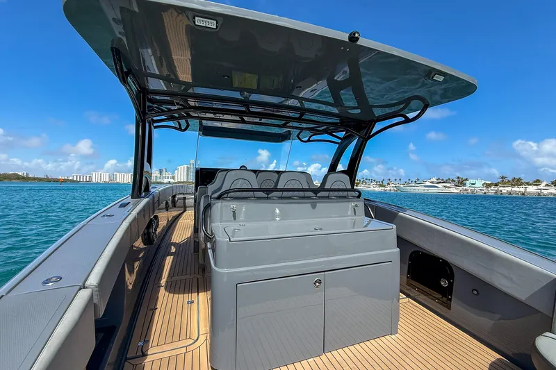  Yacht Photos Pics 2023 Midnight Express 43 Solstice boat on water, featuring sleek design and spacious deck.