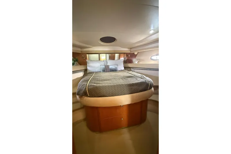  Yacht Photos Pics Luxurious bedroom interior of 2004 Meridian 459 Motoryacht with elegant bedding.
