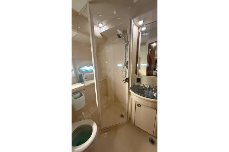  Yacht Photos Pics Bathroom interior of 2004 Meridian 459 Motoryacht with shower and sink.