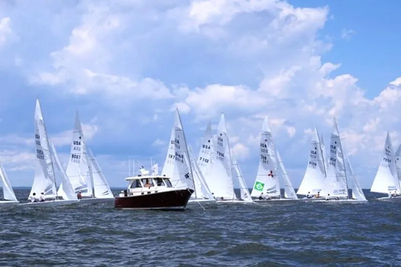 Off Islander Yacht Photos Pics 2007 Legacy Yachts 32 amidst sailboats on a sunny day.