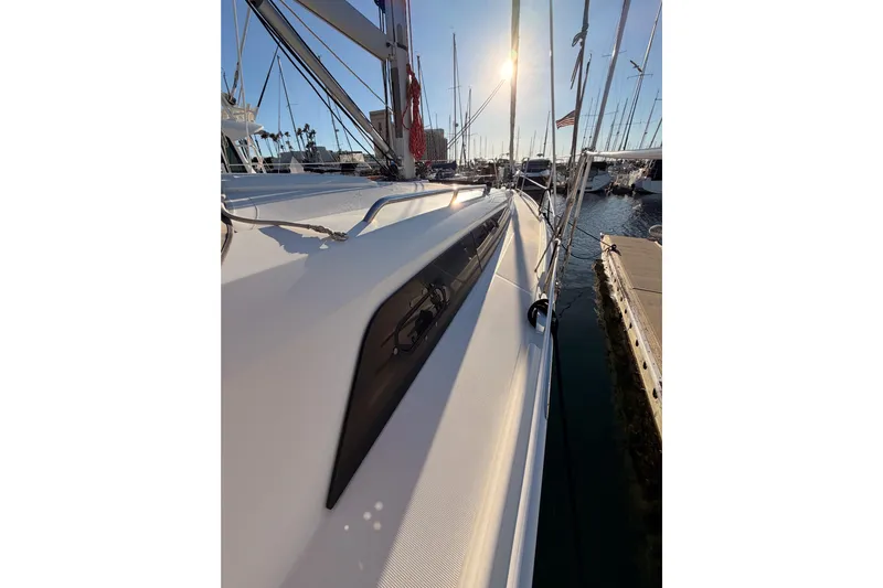  Yacht Photos Pics Beneteau Oceanis 30.1 sailboat docked at marina, 2020 model, sunlit deck view.