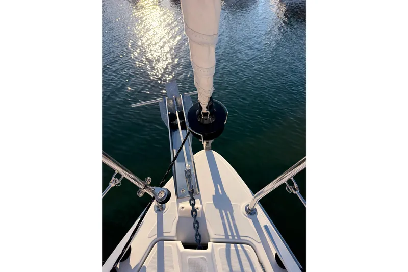  Yacht Photos Pics Bow view of 2020 Beneteau Oceanis 30.1 sailboat on calm water.