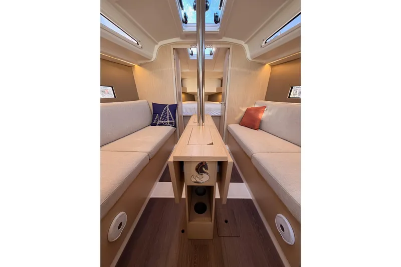  Yacht Photos Pics Interior of 2020 Beneteau Oceanis 30.1 yacht, featuring cozy seating and modern design.