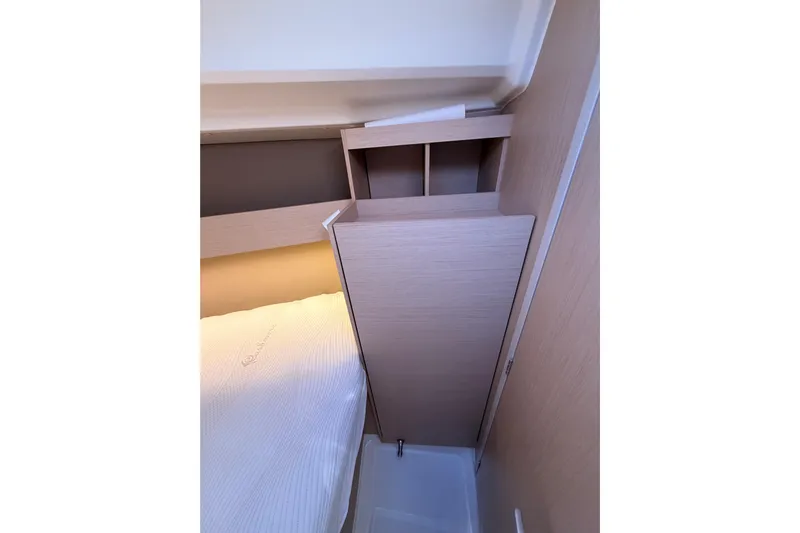  Yacht Photos Pics Interior cabin of 2020 Beneteau Oceanis 30.1 yacht, featuring a compact, modern design.