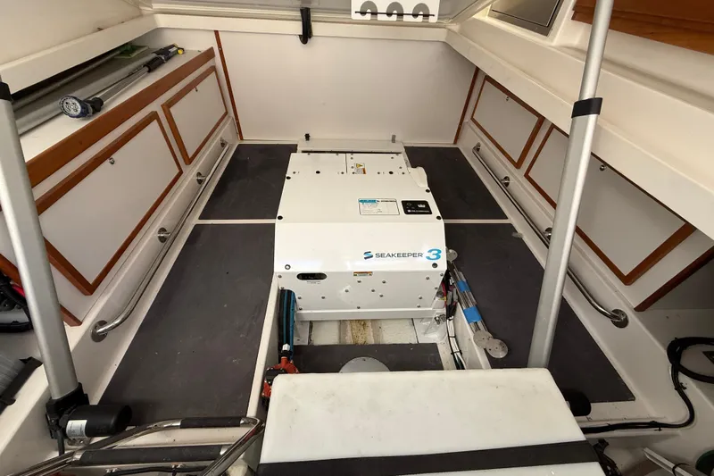 Klosters II Yacht Photos Pics 2022 Back Cove 34O boat interior featuring Seakeeper 3 stabilizer system.