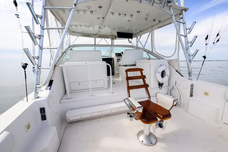 Marlin Spike Yacht Photos Pics 1998 Bertram 36 Moppie yacht interior with fishing chair and helm station.