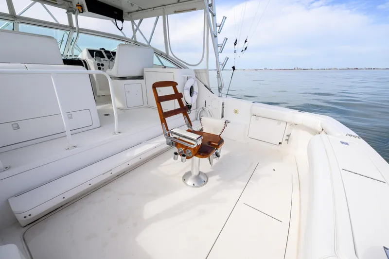 Marlin Spike Yacht Photos Pics 1998 Bertram 36 Moppie boat interior with fishing chair and ocean view.