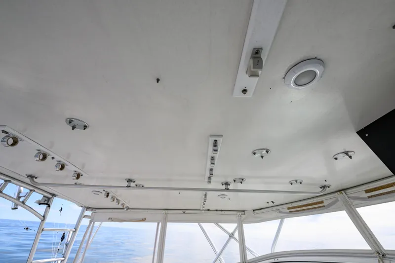Marlin Spike Yacht Photos Pics Ceiling view of 1998 Bertram 36 Moppie boat with installed lighting fixtures.