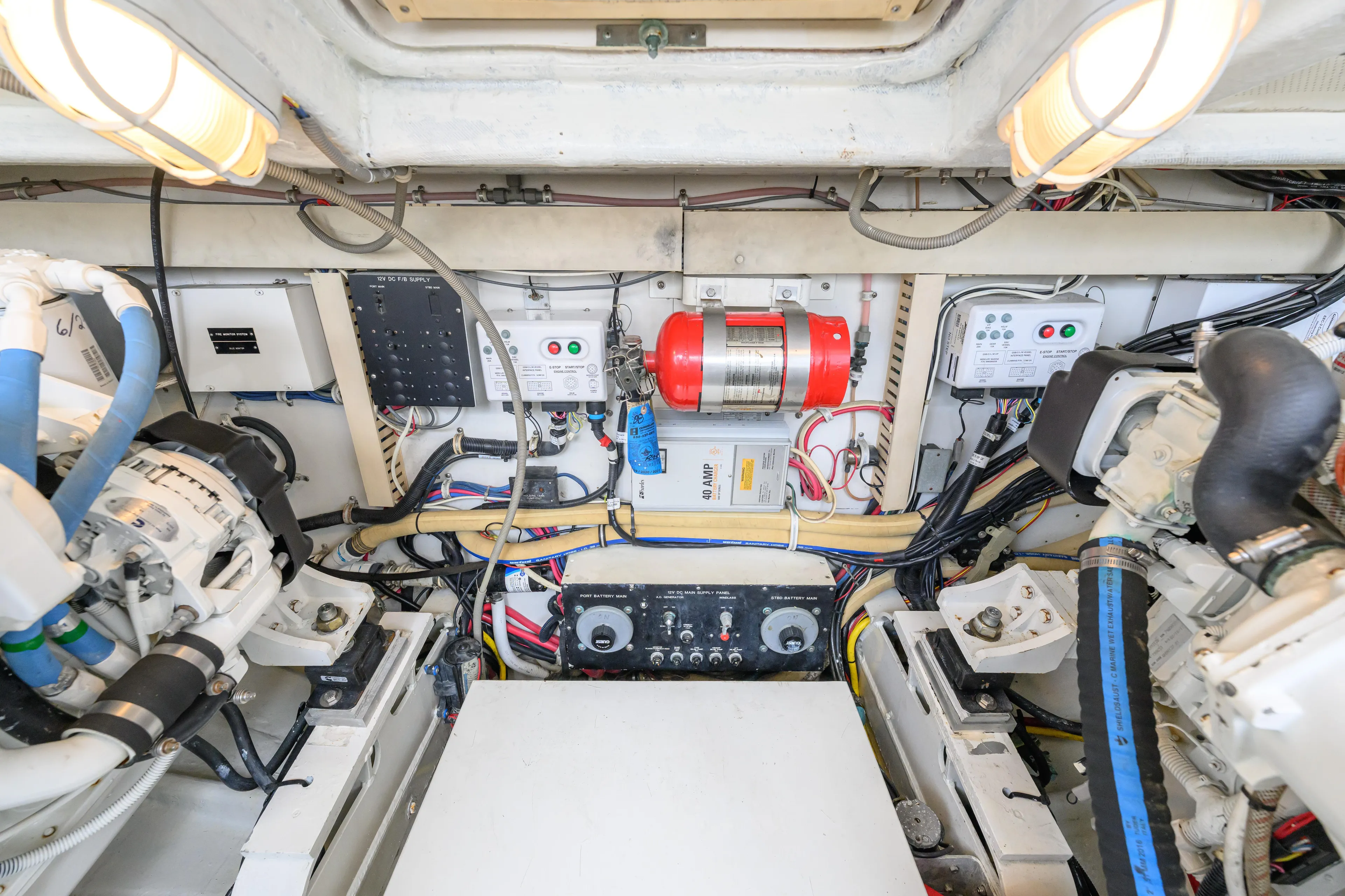 Marlin Spike Yacht Photos Pics Engine room of 1998 Bertram 36 Moppie boat, showcasing wiring and equipment.