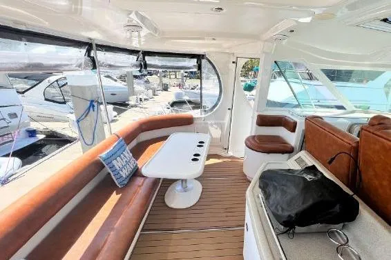 Infinity 2 Yacht Photos Pics Luxurious 2004 Sea Ray 390 Motor Yacht interior with leather seating and modern amenities.