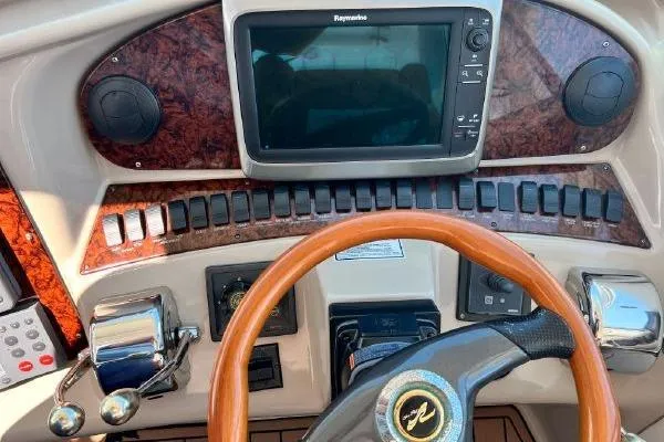 Infinity 2 Yacht Photos Pics Dashboard of a 2004 Sea Ray 390 Motor Yacht with navigation controls.