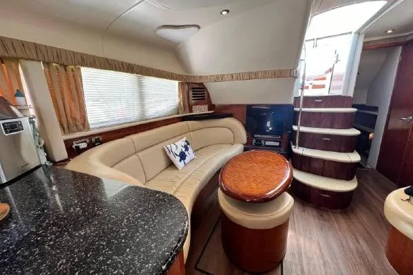 Infinity 2 Yacht Photos Pics Luxurious 2004 Sea Ray 390 Motor Yacht interior with elegant seating and modern amenities.