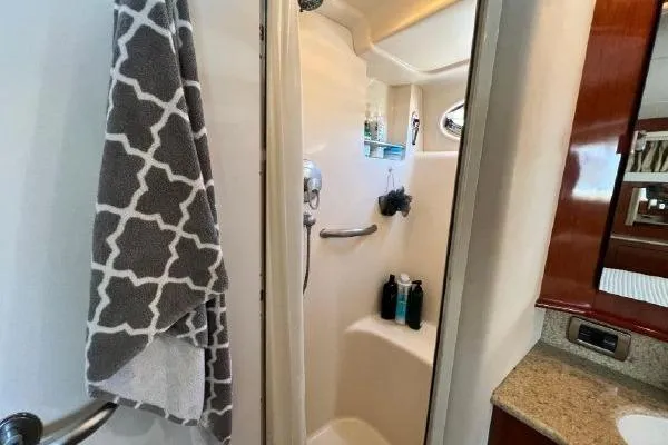 Infinity 2 Yacht Photos Pics Shower area in 2004 Sea Ray 390 Motor Yacht with towel and toiletries.