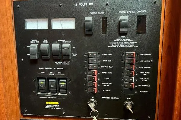 Infinity 2 Yacht Photos Pics Control panel of a 2004 Sea Ray 390 Motor Yacht, featuring switches and gauges.