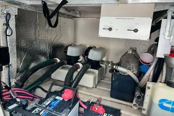 Infinity 2 Yacht Photos Pics Engine room of 2004 Sea Ray 390 Motor Yacht with batteries and equipment.