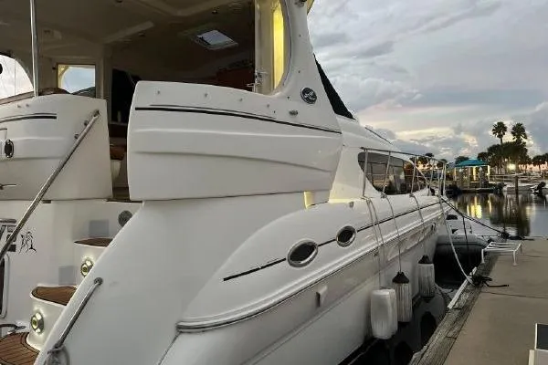 Infinity 2 Yacht Photos Pics 2004 Sea Ray 390 Motor Yacht docked at marina, showcasing sleek design and luxury features.