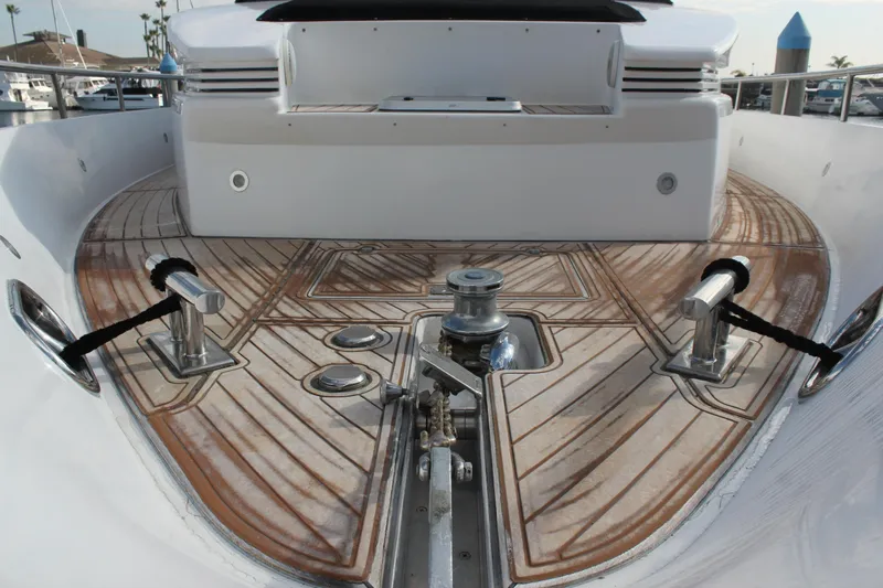 Allegro Yacht Photos Pics 1999 Horizon 70 Motor Yacht deck with polished wood and metal fittings.