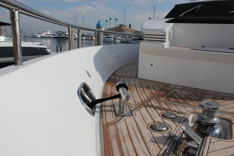 Allegro Yacht Photos Pics Deck view of 1999 Horizon 70 Motor Yacht in marina setting.