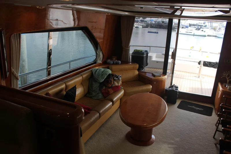 Allegro Yacht Photos Pics Luxurious interior of a 1999 Horizon 70 Motor Yacht with marina view.