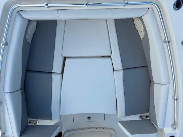  Yacht Photos Pics 2018 Cobia 320 CC boat interior seating area with cushioned seats and sleek design.