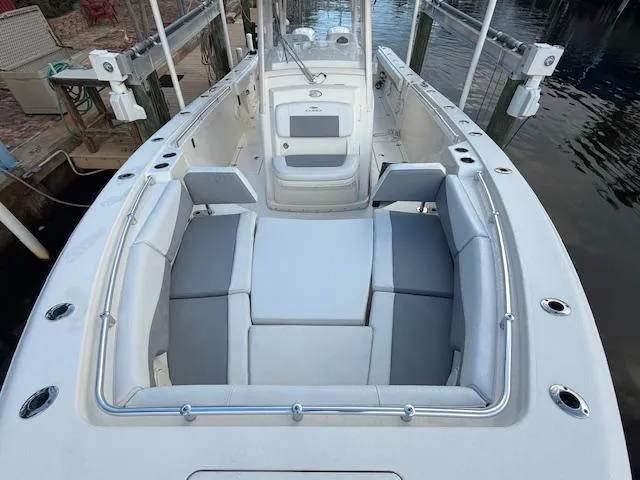  Yacht Photos Pics 2018 Cobia 320 CC boat with spacious seating and sleek design.