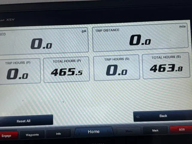  Yacht Photos Pics Display screen of a 2018 Cobia 320 CC showing trip and total hours data.