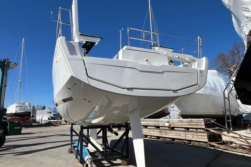  Yacht Photos Pics 2026 Dufour 37 yacht on dry dock, showcasing sleek design and modern features.