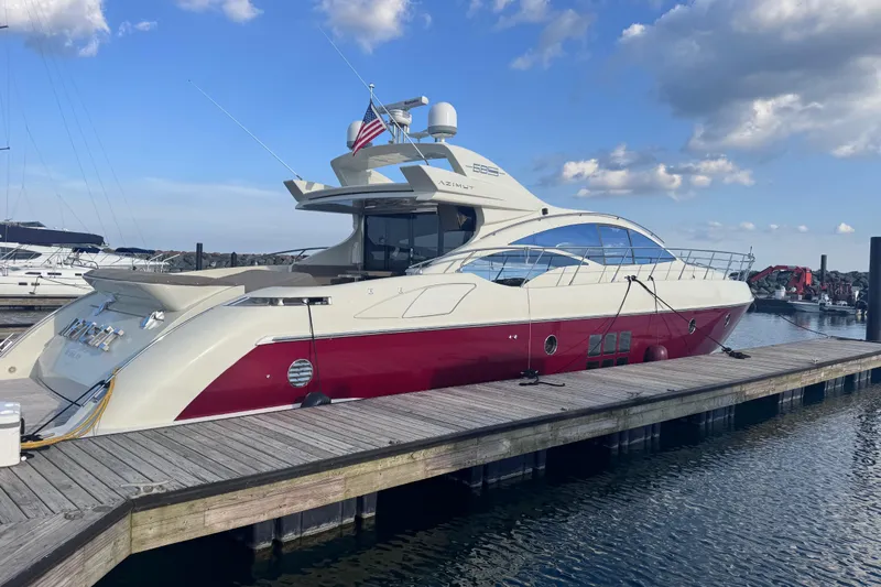  Yacht Photos Pics Luxury 2006 Azimut 68S yacht docked at marina under blue sky.