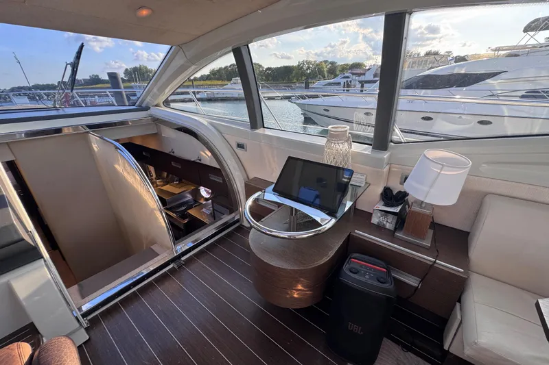  Yacht Photos Pics Luxurious interior of 2006 Azimut 68S yacht with modern decor and marina view.