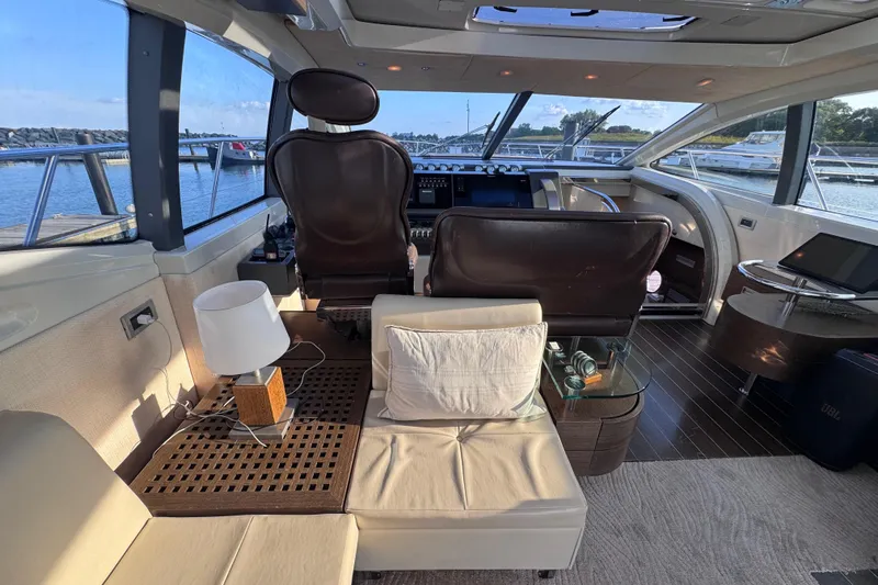  Yacht Photos Pics Luxurious interior of a 2006 Azimut 68S yacht with leather seating and panoramic windows.