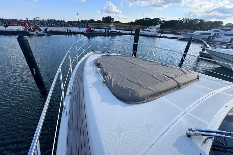  Yacht Photos Pics 2006 Azimut 68S yacht docked in marina, featuring sleek deck design.