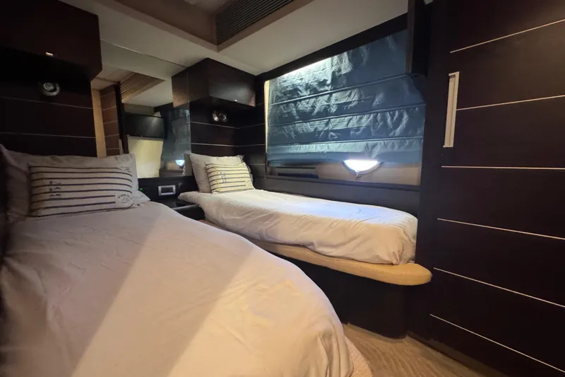  Yacht Photos Pics Luxurious twin cabin interior of 2006 Azimut 68S yacht with modern design.