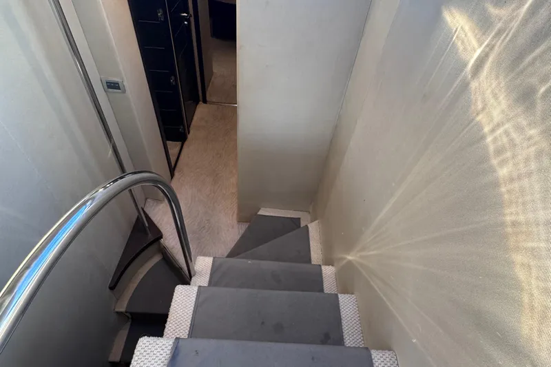  Yacht Photos Pics Staircase inside 2006 Azimut 68S yacht with sleek design and modern interior.