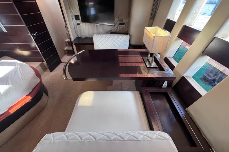  Yacht Photos Pics Luxurious interior of 2006 Azimut 68S yacht with elegant furnishings and natural light.