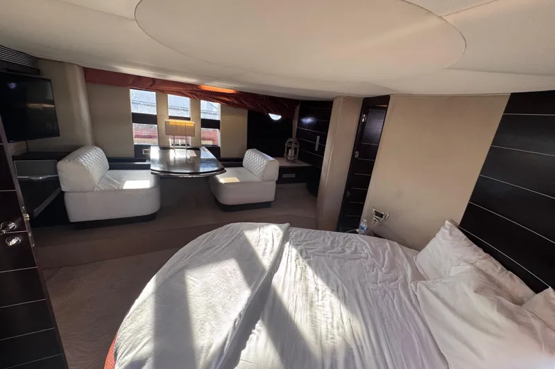  Yacht Photos Pics Luxurious interior of 2006 Azimut 68S yacht with elegant seating and round bed.