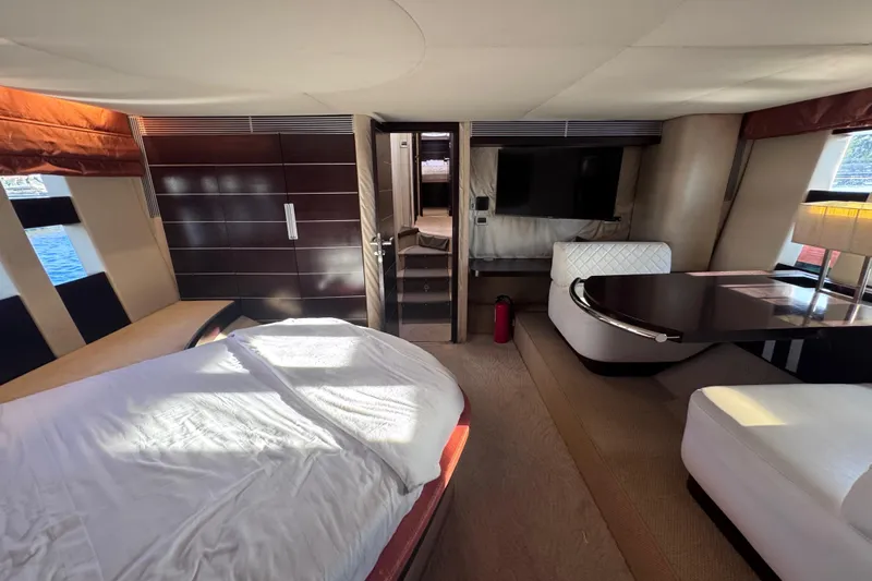  Yacht Photos Pics Luxurious interior of a 2006 Azimut 68S yacht with modern furnishings and elegant design.