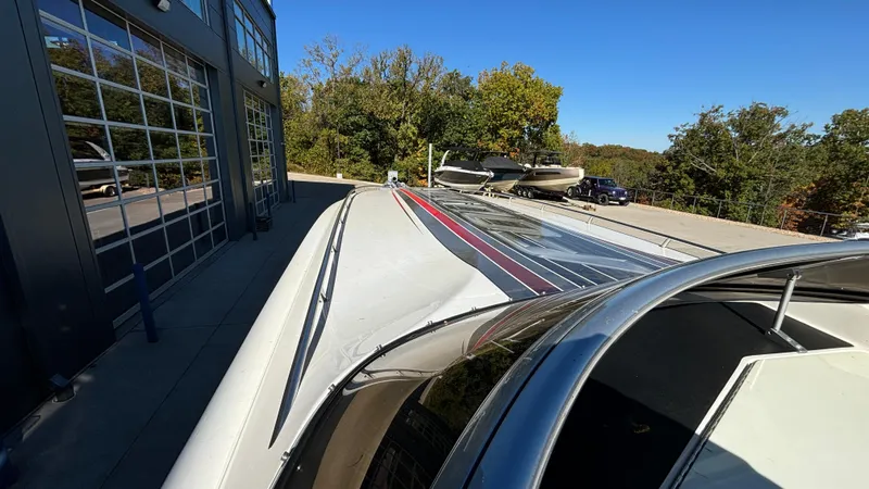  Yacht Photos Pics 2008 Fountain 47 Lightning boat parked outside, showcasing sleek design and vibrant colors.