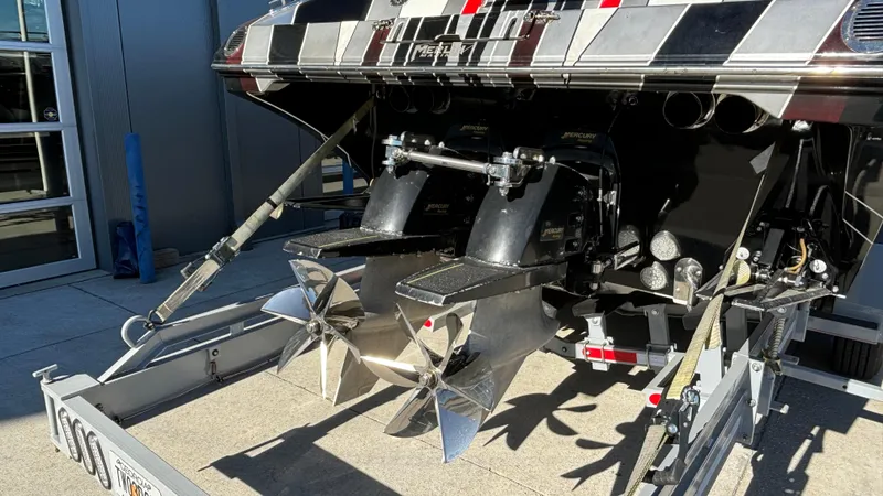  Yacht Photos Pics Rear view of a 2008 Fountain 47 Lightning boat with dual propellers on a trailer.