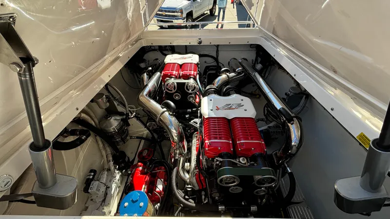  Yacht Photos Pics Engine compartment of a 2008 Fountain 47 Lightning boat, showcasing powerful dual engines.