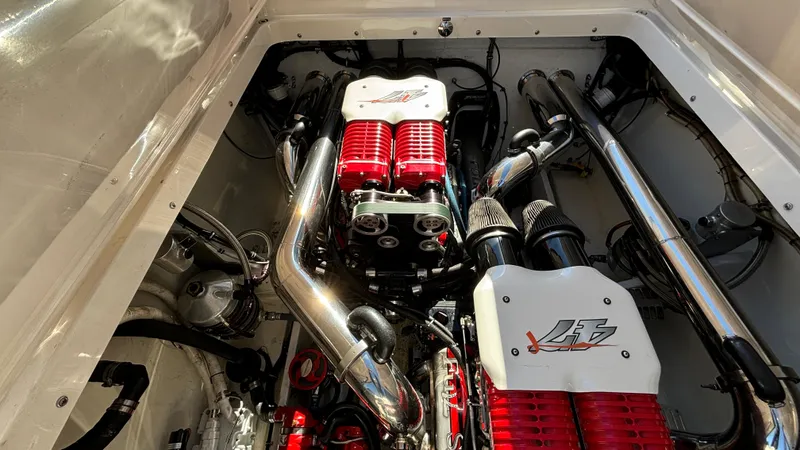  Yacht Photos Pics Engine compartment of a 2008 Fountain 47 Lightning boat, showcasing powerful twin engines.