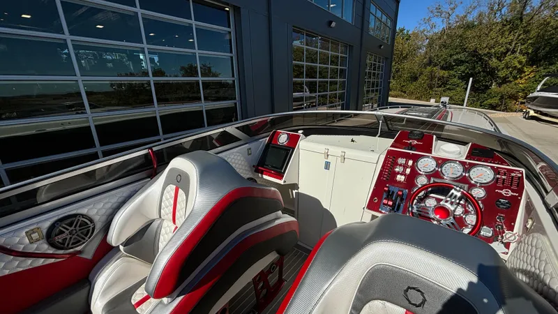  Yacht Photos Pics Interior of a 2008 Fountain 47 Lightning boat with red and silver accents.
