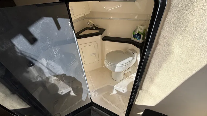  Yacht Photos Pics 2008 Fountain 47 Lightning boat bathroom interior with toilet and sink.