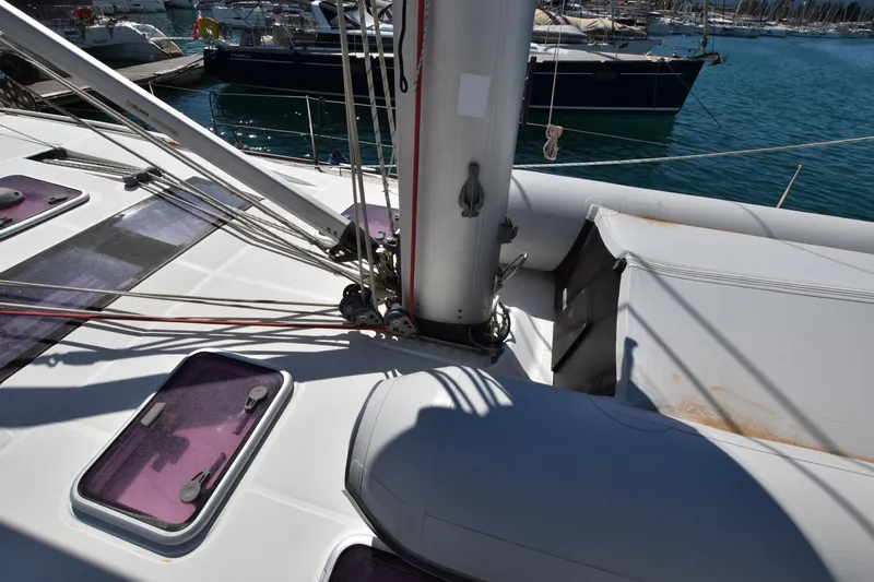 Panope Yacht Photos Pics Deck view of 2009 Beneteau Oceanis 54 sailboat, showcasing rigging and hatches.