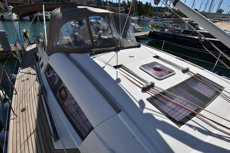 Panope Yacht Photos Pics 2009 Beneteau Oceanis 54 sailboat docked, featuring sleek deck design and spacious cockpit.